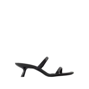 Sleek Black Calfskin Mules With Curved Heel